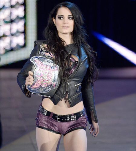 WWE Star, Paige holding her WWE Divas belt